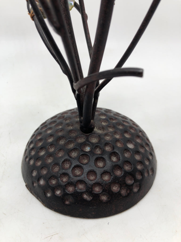 BROWN METAL W/LEAVES AND BIRDS TOWEL HOLDER.