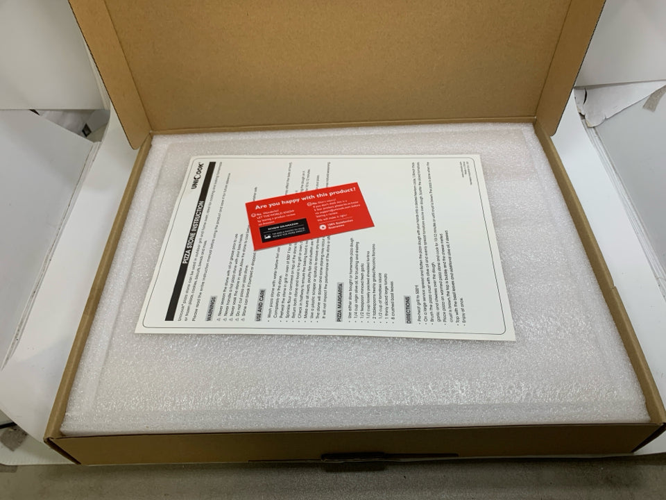NIB UNICOOK PIZZA STONE.