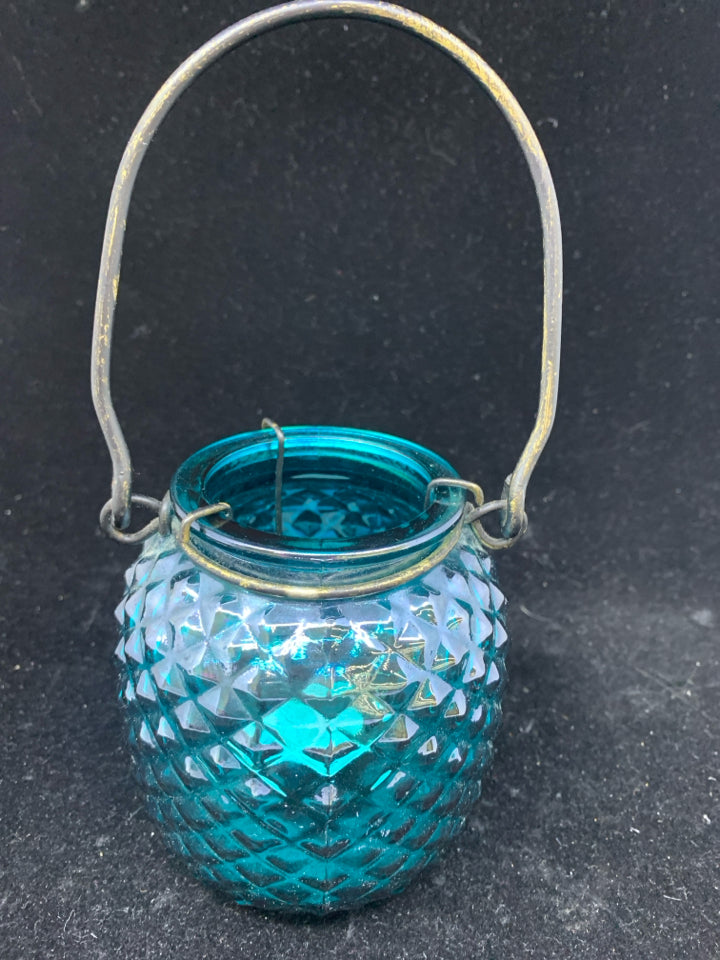 TEAL GLASS LANTERN TEA LIGHT HOLDER.