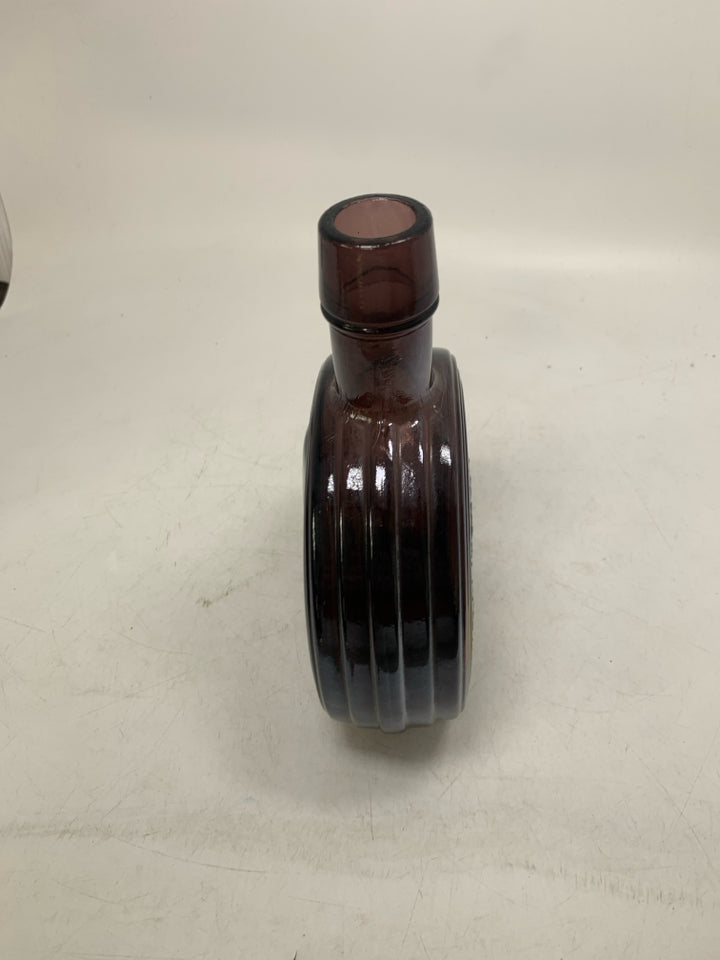 PURPLE GLASS DWIGHT EISENHOWER BOTTLE.