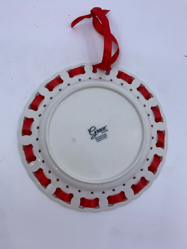 2 MILK GLASS RED RIBBON WALL ART.