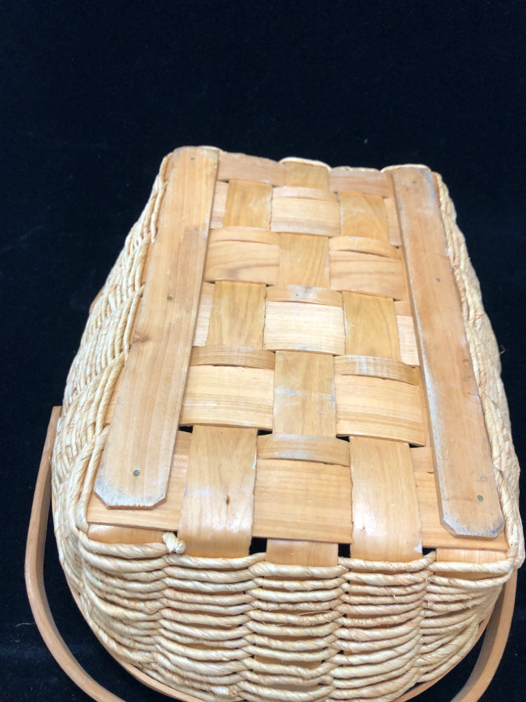 WOVEN BASKET W/2 WOODEN HANDLES.