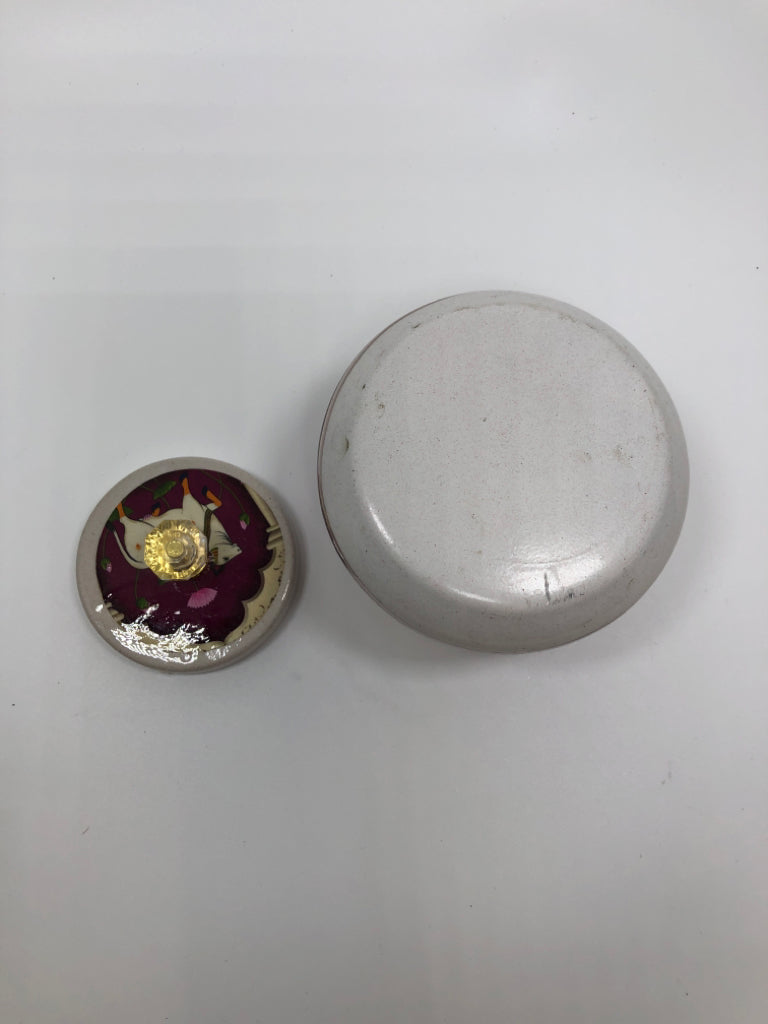 WHITE METAL JAR W/COW PRINT AND LID.