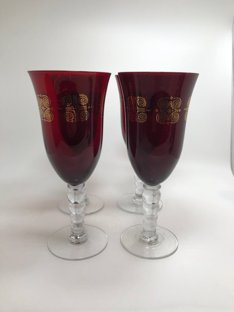 4 RUBY RED GOBLET WITH GOLD SWIRL DESIGN.