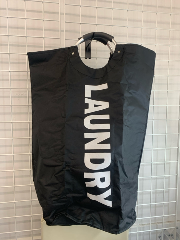 BLACK CANVAS LAUNDRY BAG W/METAL HANDLES.