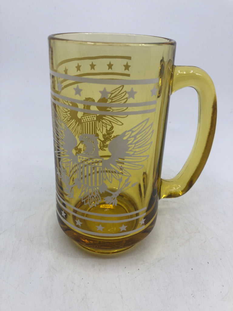 6 AMBER GLASS BEER MUG W/ WHITE PRINTED EAGLE.
