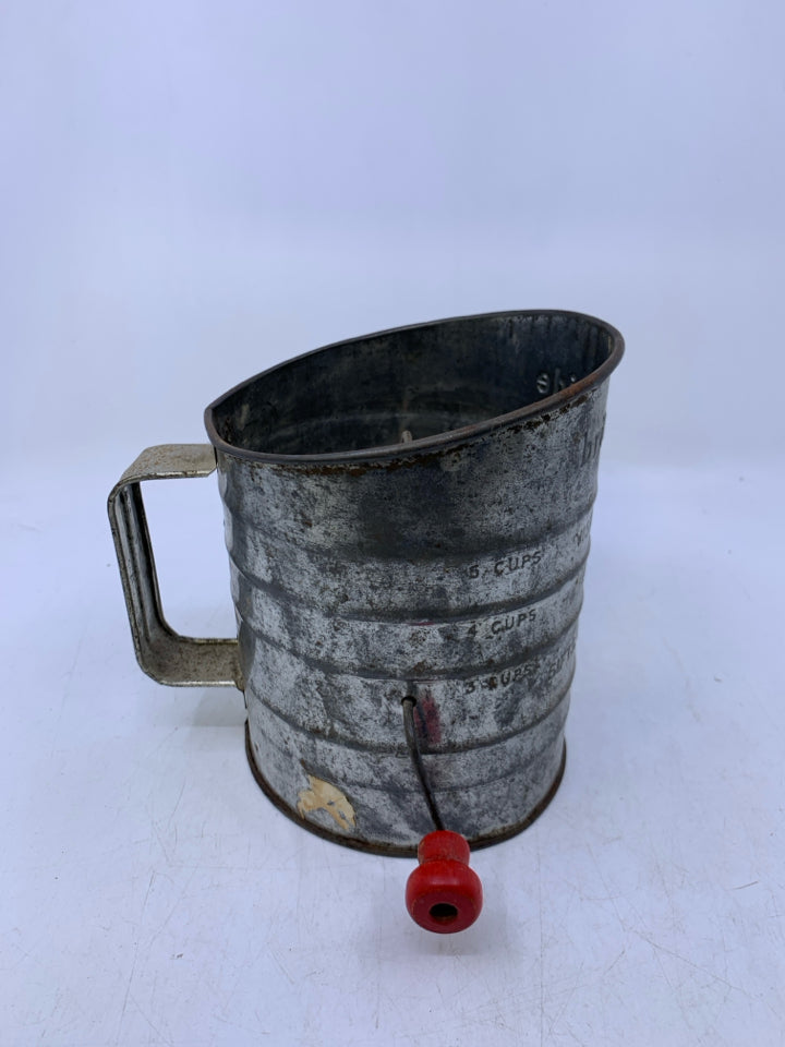 BRITE-PRIDE 5 CUP FLOUR SIFTER W/ RED HANDLE.