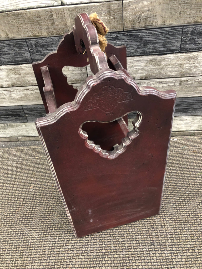 PRIMITIVE WINE HOLDER.