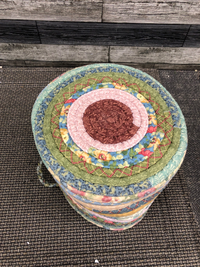 QUILTED STRIPED FABRIC BASKET.