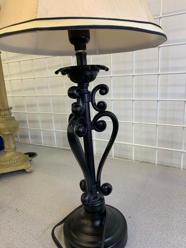 BLACK TABLE LAMP W/CREAM, BLACK STRIPE SHADE.