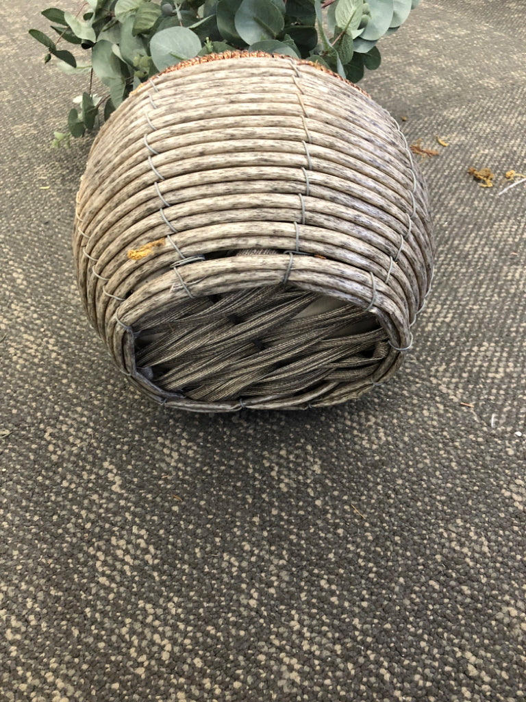 WOVEN PLANTER W/ FAUX EUCALYPTUS.