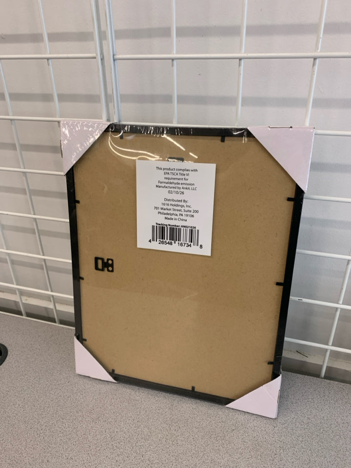NIP PHOTO FRAME.