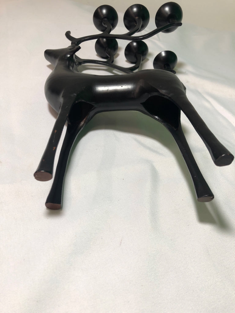 BLACK METAL DEER W/ 6 GREEN CIRCLE CANDLES ON ANTLERS.
