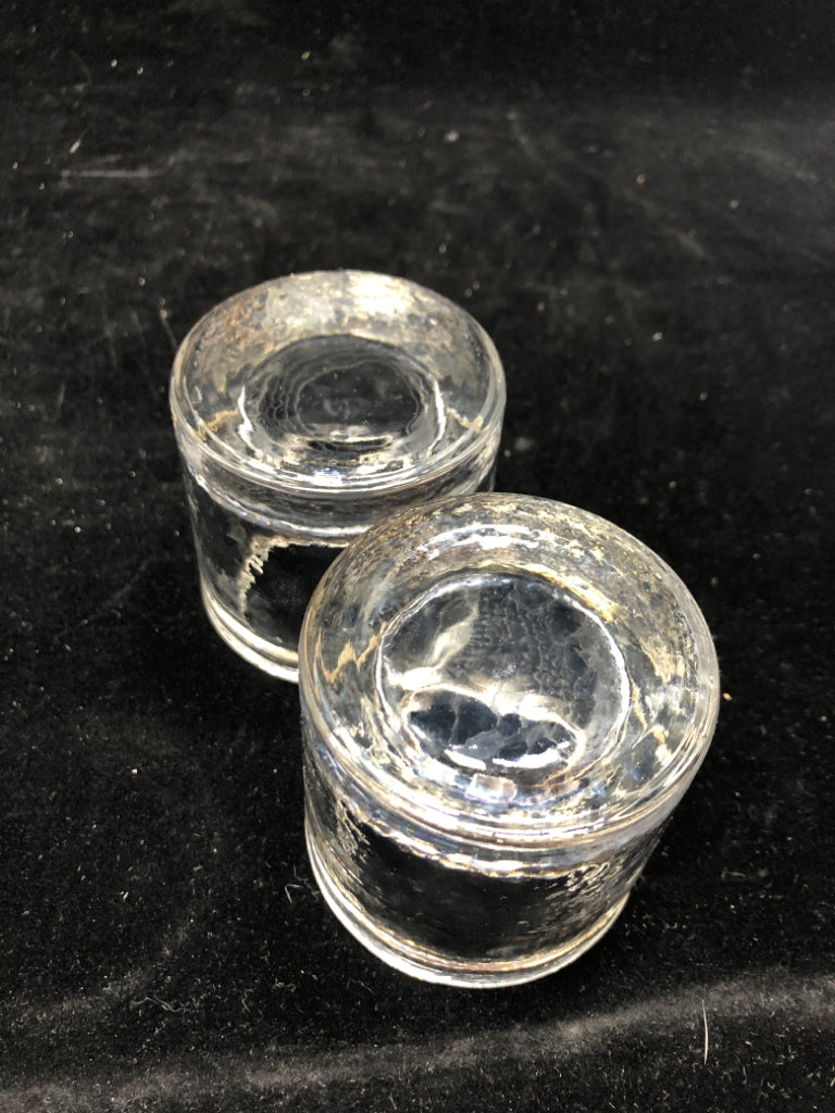 2PC CLEAR VOTIVE HOLDERS.