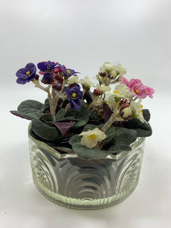 FAUX VIOLETS IN CUT GLASS BOWL.