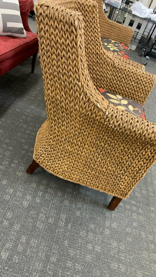 WICKER CHAIR W/BROWN CUSHION.