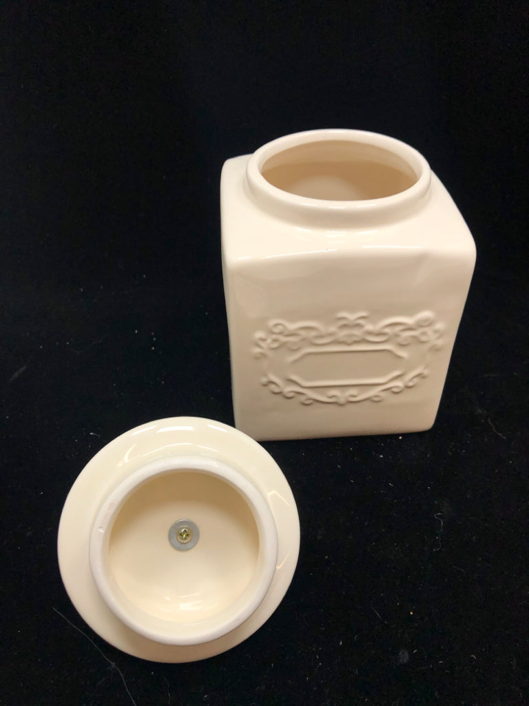 CREAM CERAMIC JAR W/JEWEL LID.
