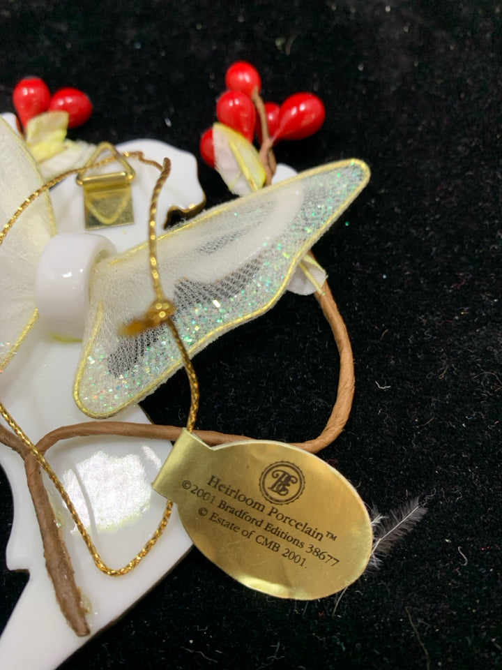 THE ROSE HIP FAIRY PORCELAIN ORNAMENT.