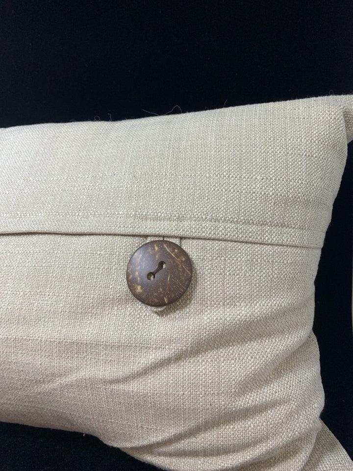 BEIGE TEXTURED RECTANGLE THROW PILLOW W/BROWN 3 BUTTON.