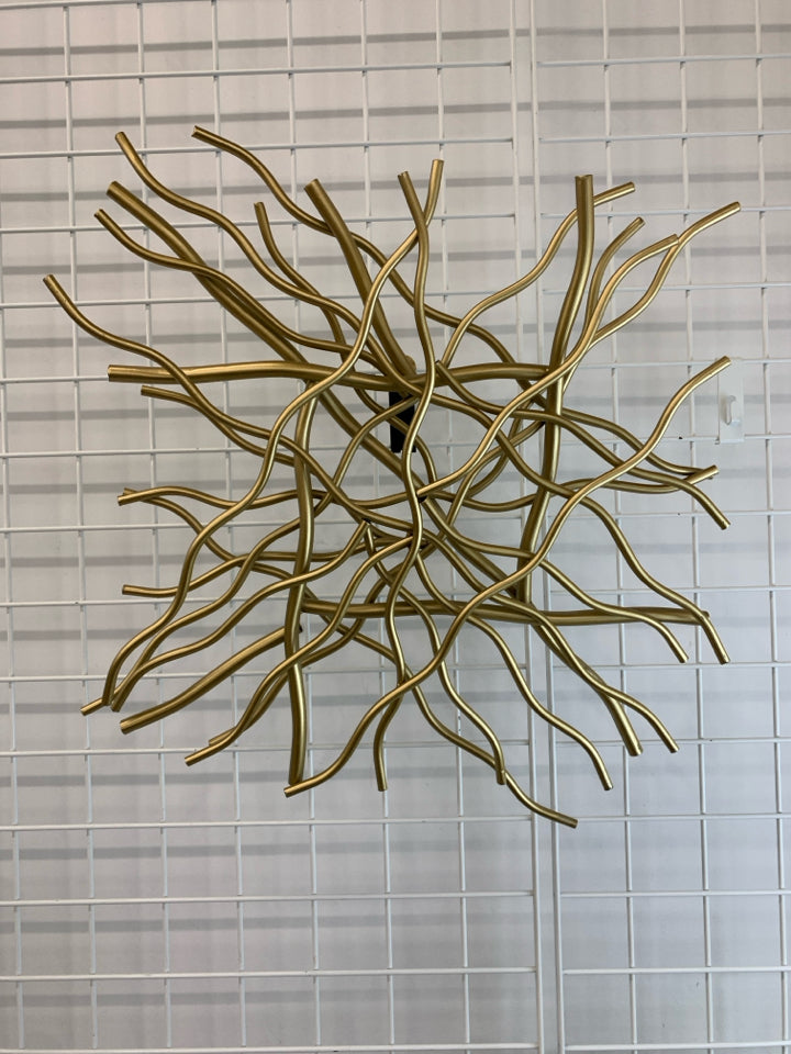 BRANCH-INSPIRED GOLD WALL SCULPTURE.