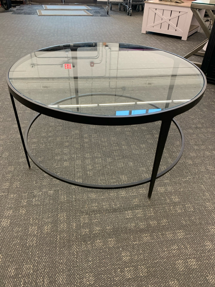 ROUND BLACK/GLASS COFFEE TABLE.