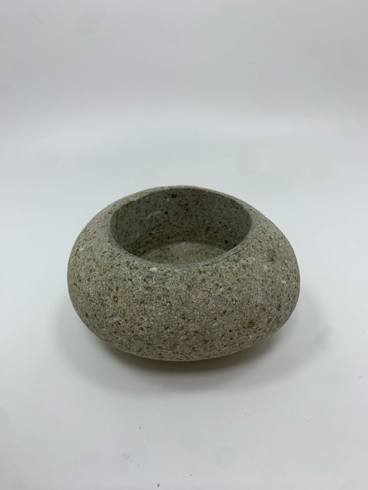 STONE CANDLE HOLDER.
