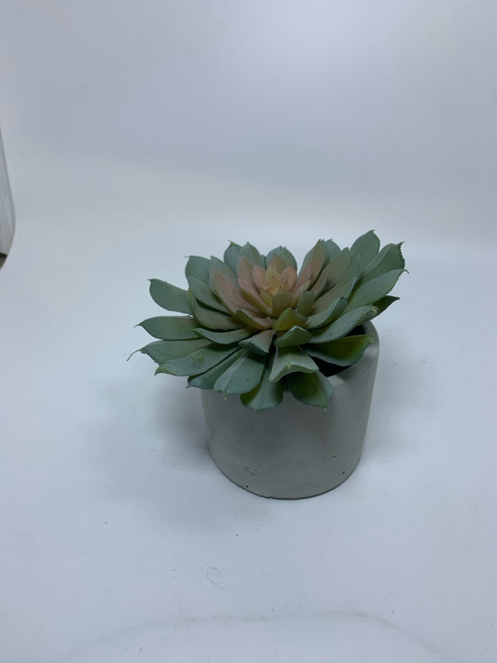 CEMENT PLANTER W/ FAUX SUCCULENT.