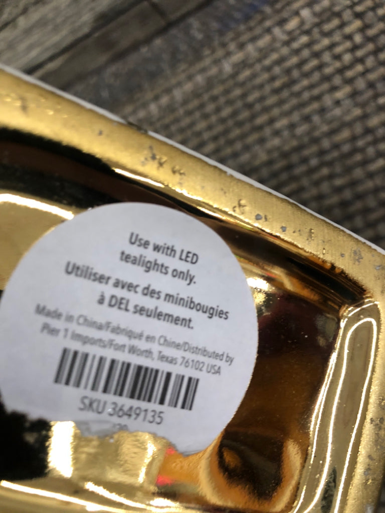 GOLD/ CREAM TEA LIGHT HOLDER HOUSE.