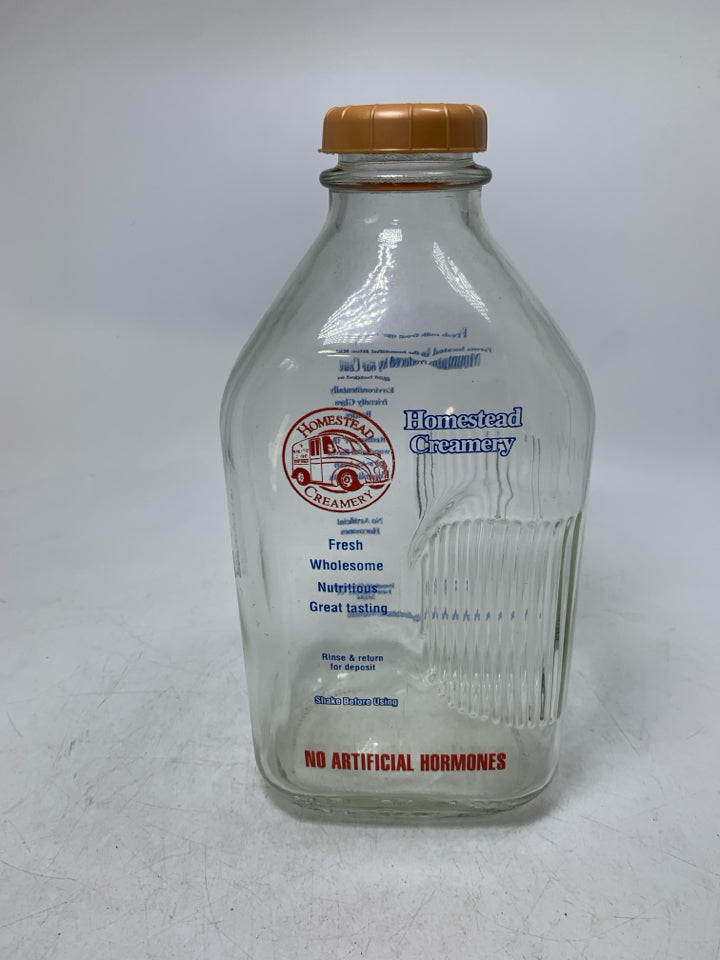 HOMESTEAD CREAMERY EMPTY MILK BOTTLE.
