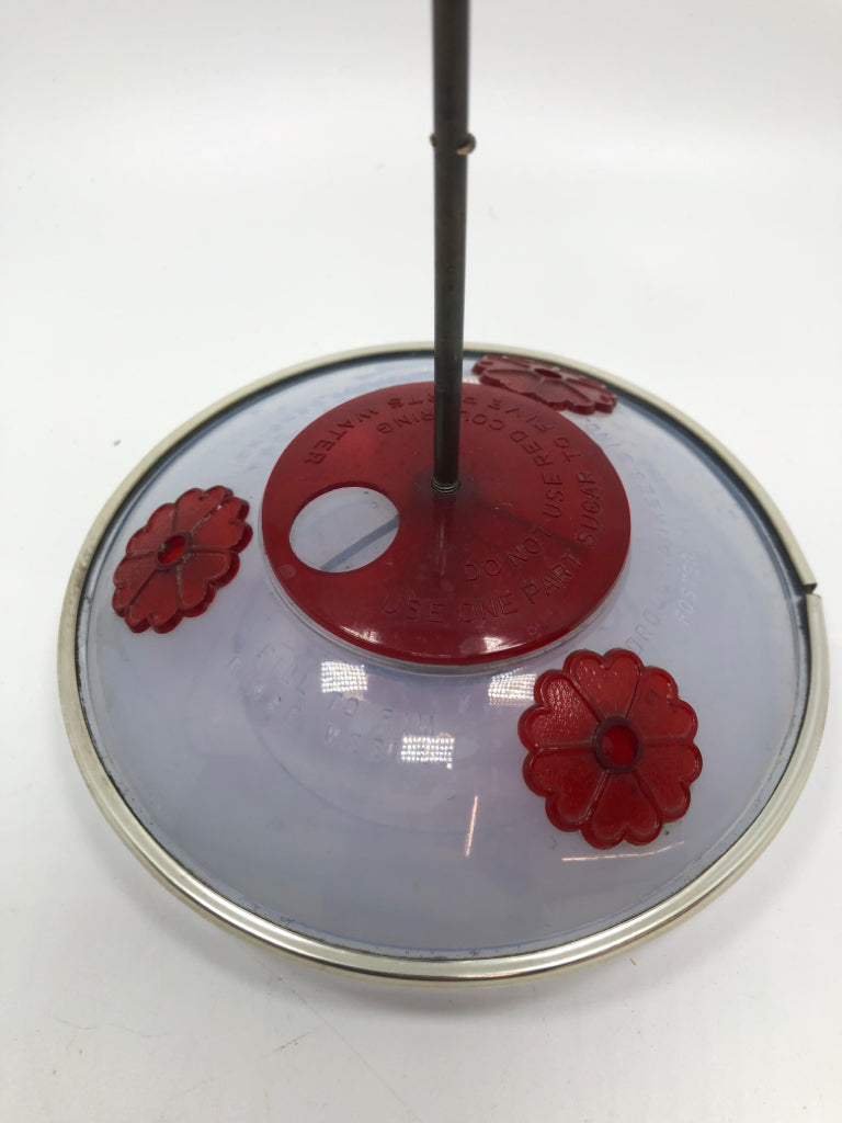 PLASTIC HUMMINGBIRD FEEDER.