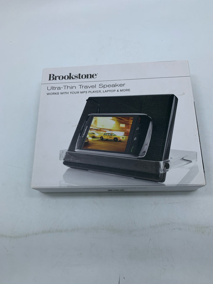 NIB ULTRA-THIN TRAVEL SPEAKER.