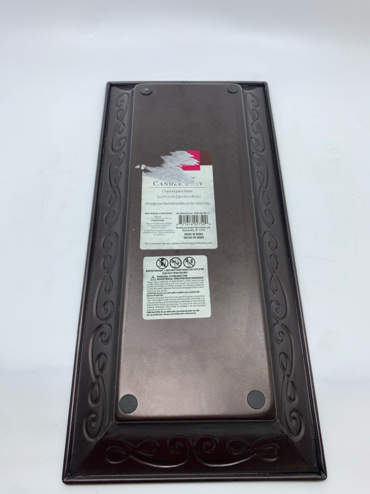 BROWN METAL TRAY W/SCROLL DETAIL.