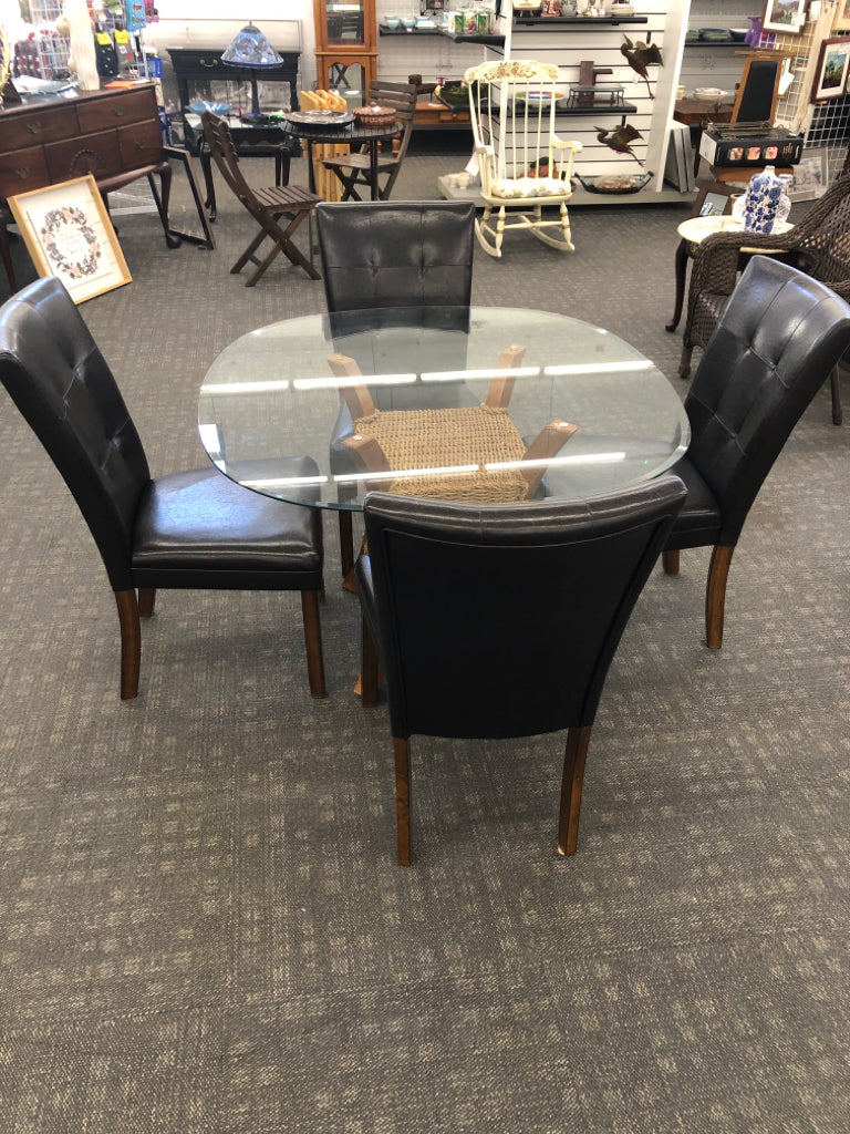 OVAL GLASS TABLE W/WICKER WRAPPED WOOD BASE, 4 BROWN FAUX LEATHER CHAIRS.