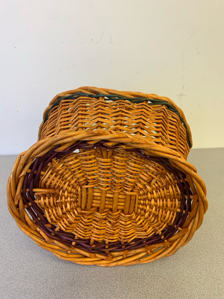 PURPLE AND GREEN WOVEN BASKET FOOTED BASKET.