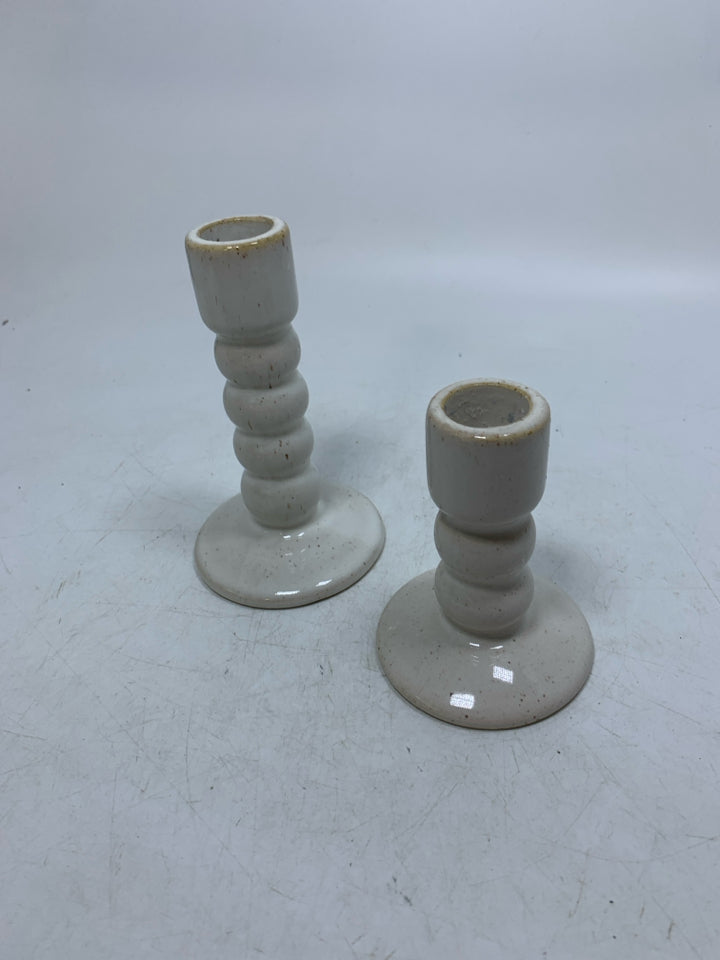2 CERAMIC SHORT TAPERED CANDLE HOLDERS.