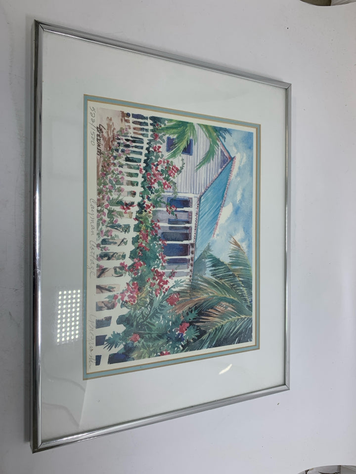 COTTAGE SCENE W/ RED FLOWERS FENCE WATERCOLOR SIGNED BY ARTIST SILVER FRAME.