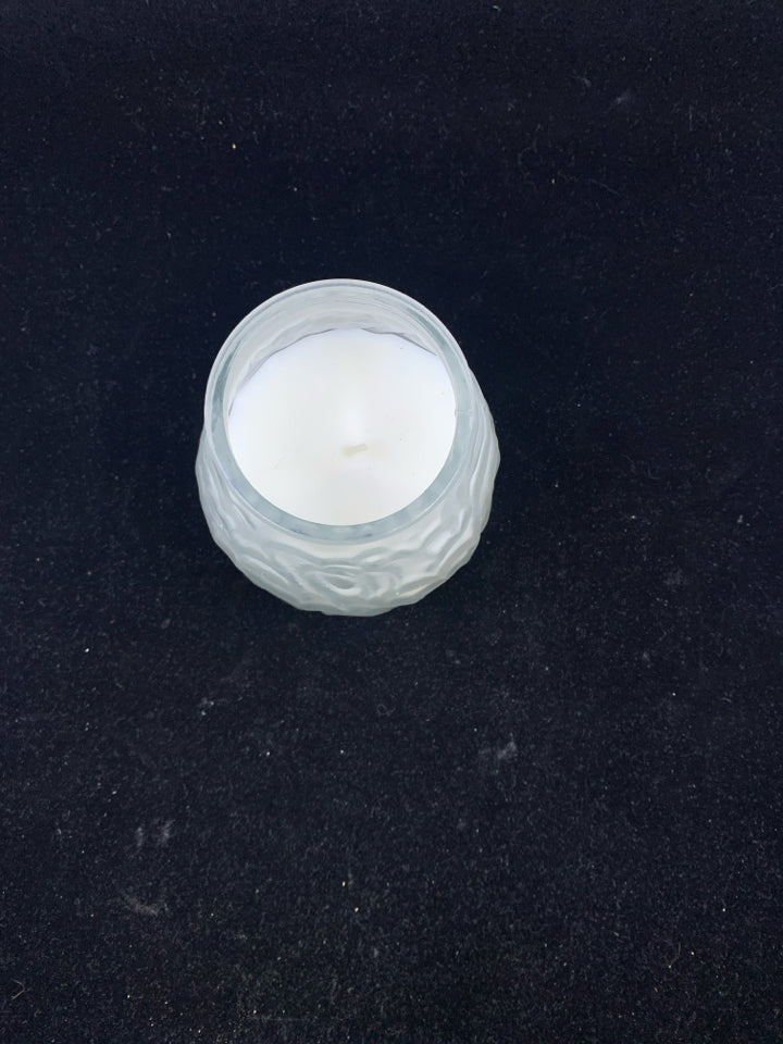 FROSTED CLEAR GLASS W/ CANDLE EMBOSSED SQUIGGLES.