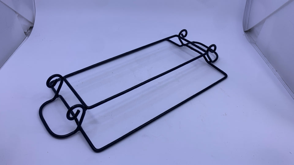 OLIVE CASSEROLE DISH IN METAL HOLDER.