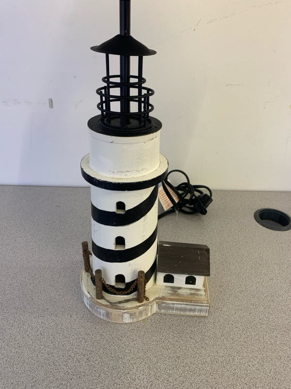 BLACK AND WHITE STRIPED LIGHTHOUSE LAMP W/ WHITE SHADE.