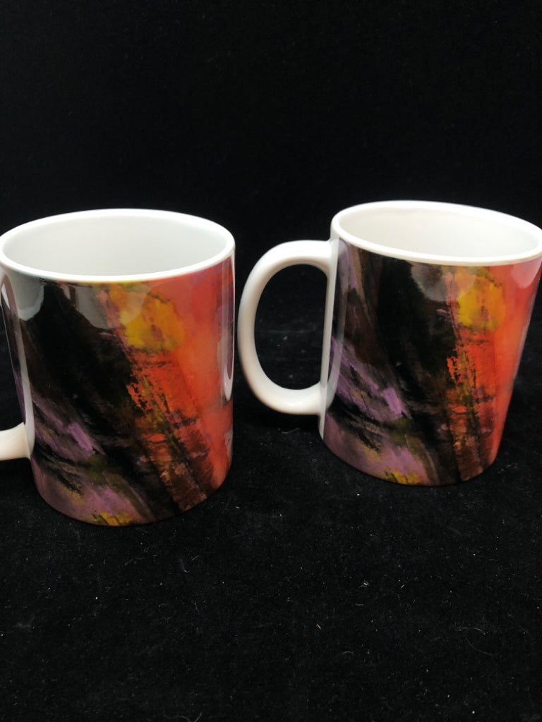 2 ABSTRACT PRINTED MUGS.