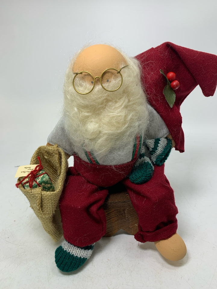 WOOD SANTA SITTING ON CHAIR W/ BURLAP SACK LIZZIE HIGH DOLLS.