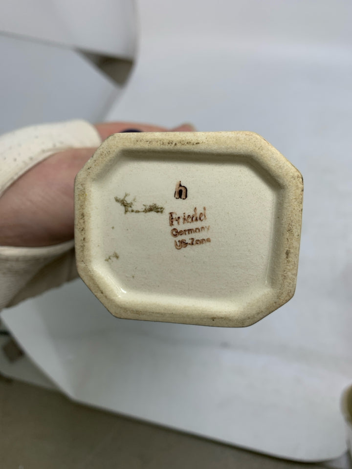 VTG FRIEDEL GERMAN MAN HOLDING BOWLING BALL.