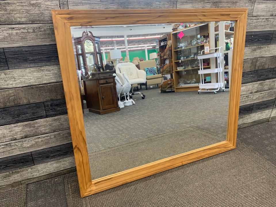 LARGE WOOD FRAMED MIRROR.