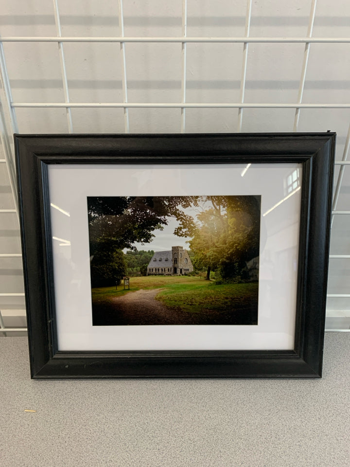 STONE COTTAGE PHOTO IN BLACK WOOD FRAME.