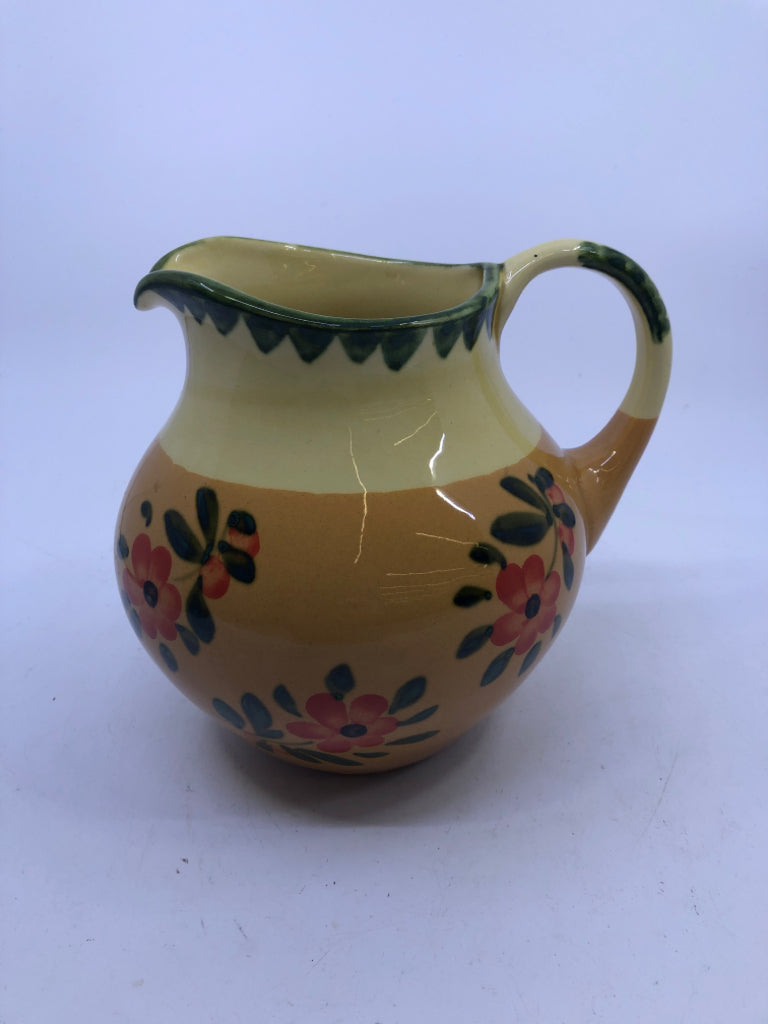 ORANGE FLORAL PAINTED PITCHER.