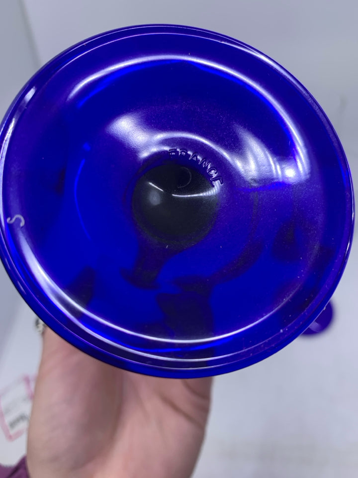 4 CLEAR GLASS CHAMPAGNE FLUTES W/ COBALT BLUE STEMS.