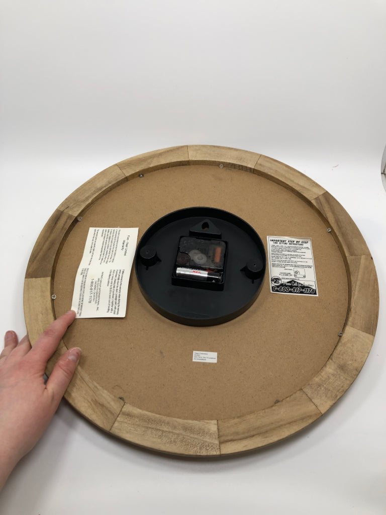 ROUND WOOD FRAMED WALL CLOCK.