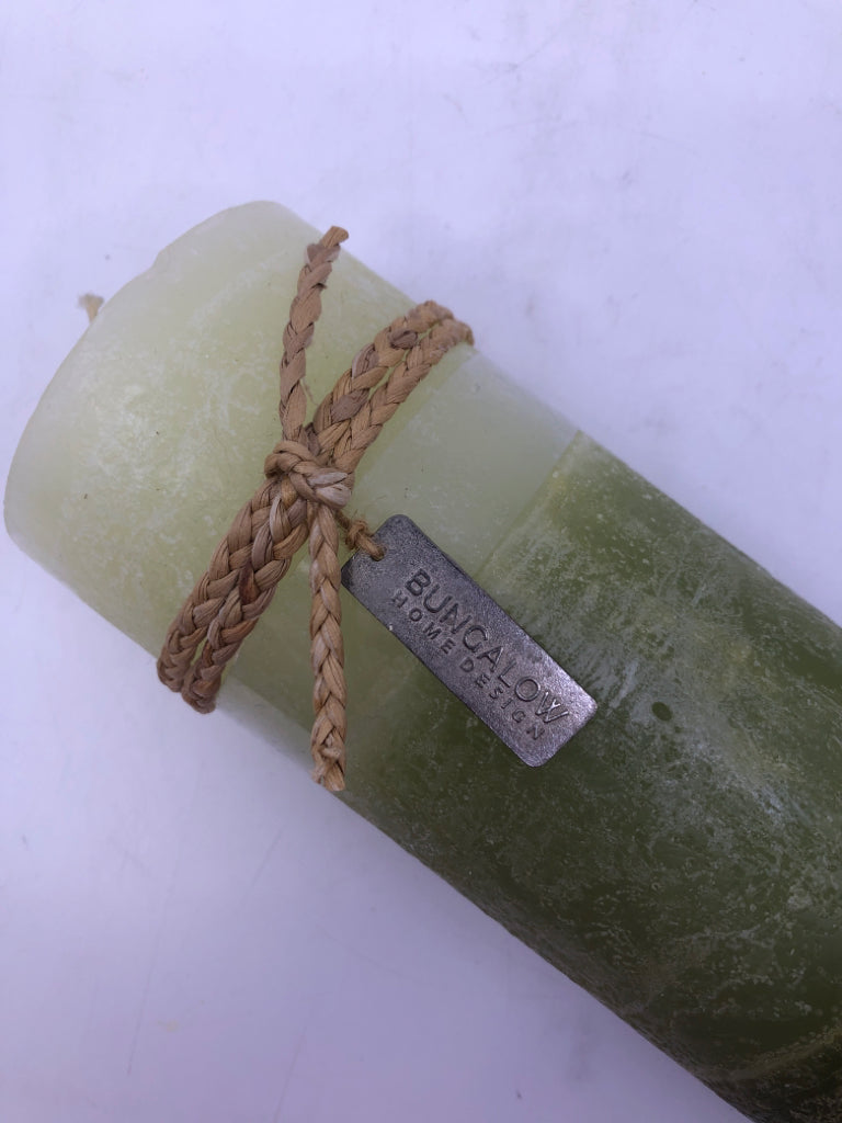 2 GREEN PILLAR CANDLE.
