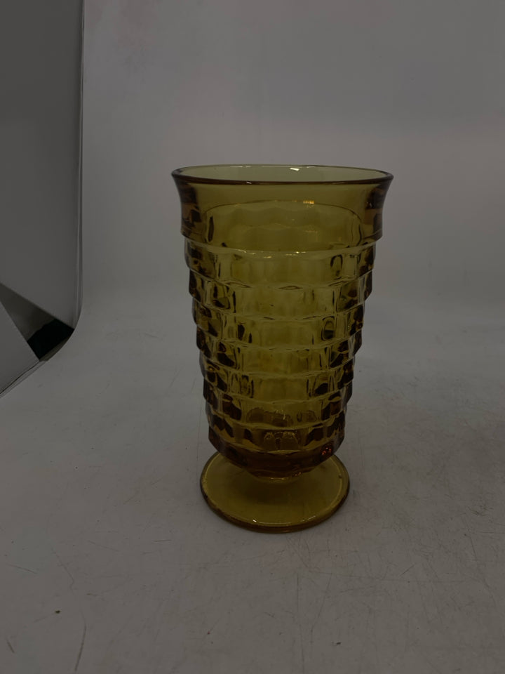 TEXTURED AMBER GLASS FOOTED VASE.