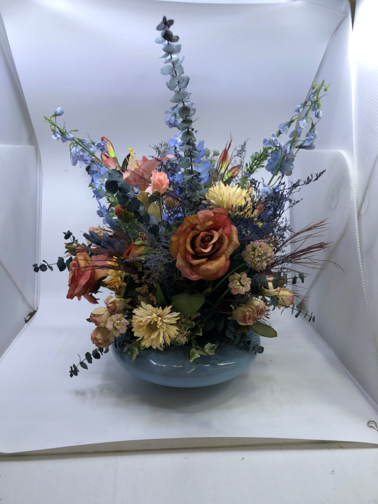 BLUE AND PINK FAUX FLORAL ARRANGEMENT.
